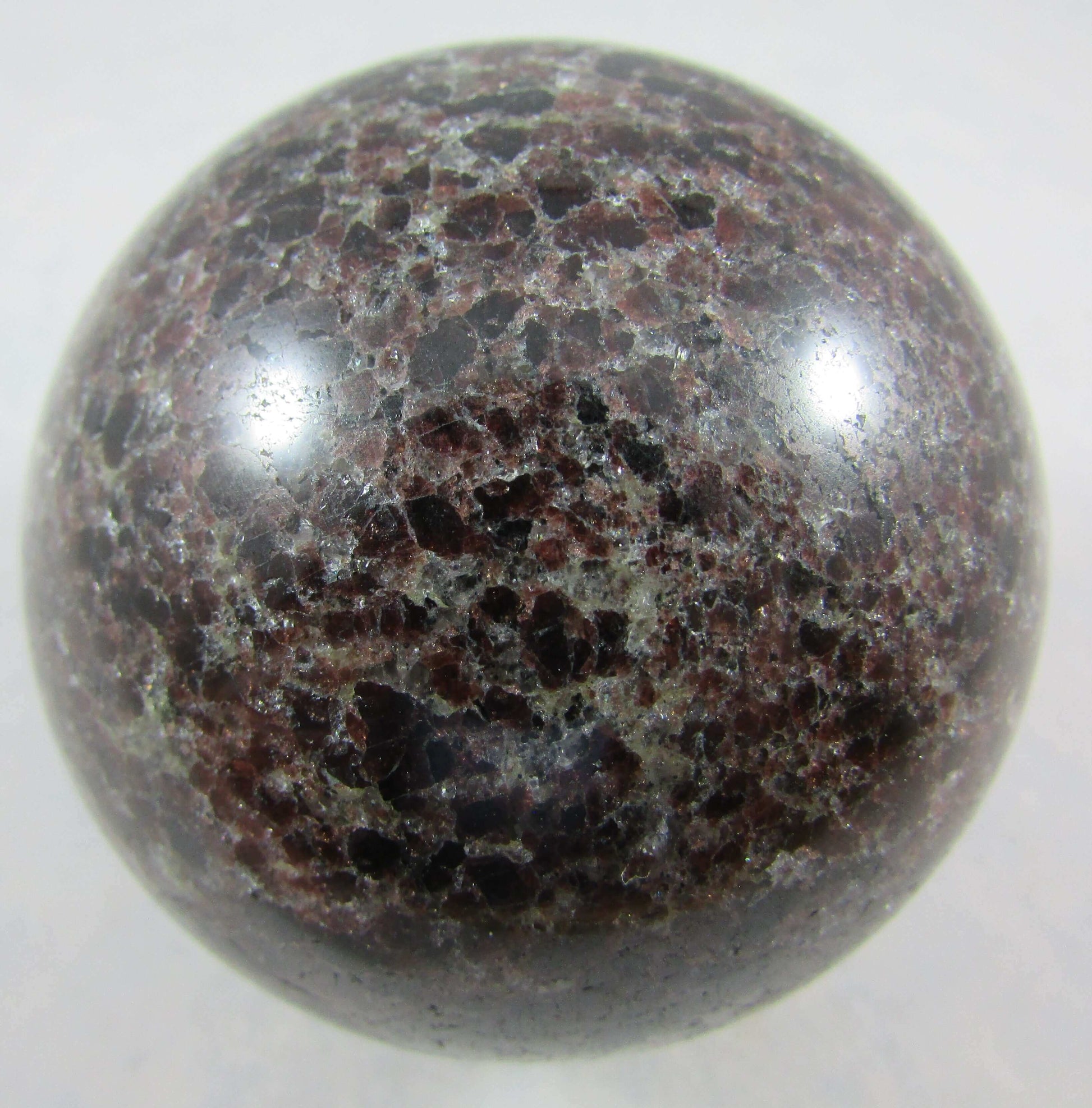 garnet crystal sphere, polished sphere, madagascar mineral