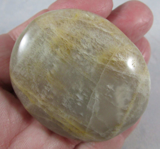 peach moonstone crystal palmstone, worry stone, madagascar