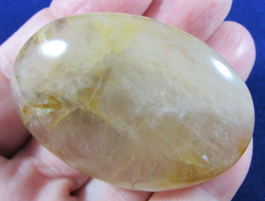 Golden Healer Crystal palmstone polished madagascar crystal