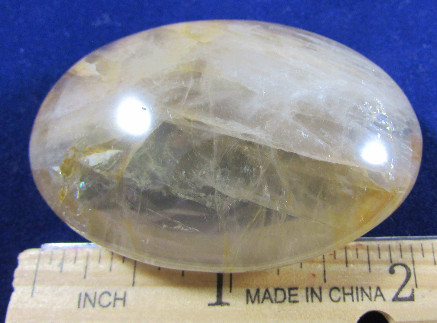 Golden Healer Crystal palmstone polished madagascar crystal