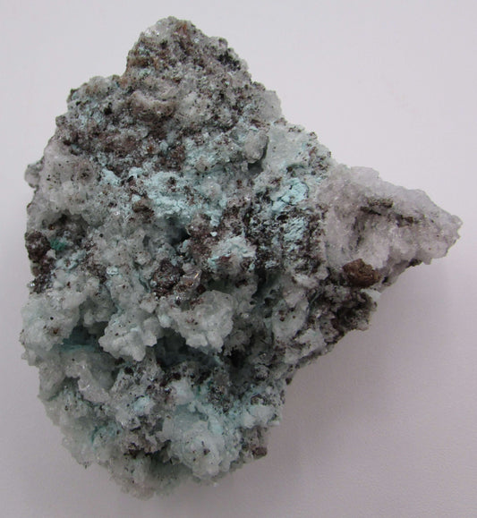 A natural mineral specimen of Aurichalcite Aragonite on Copper with a rugged texture, predominantly gray and white with hints of blue.