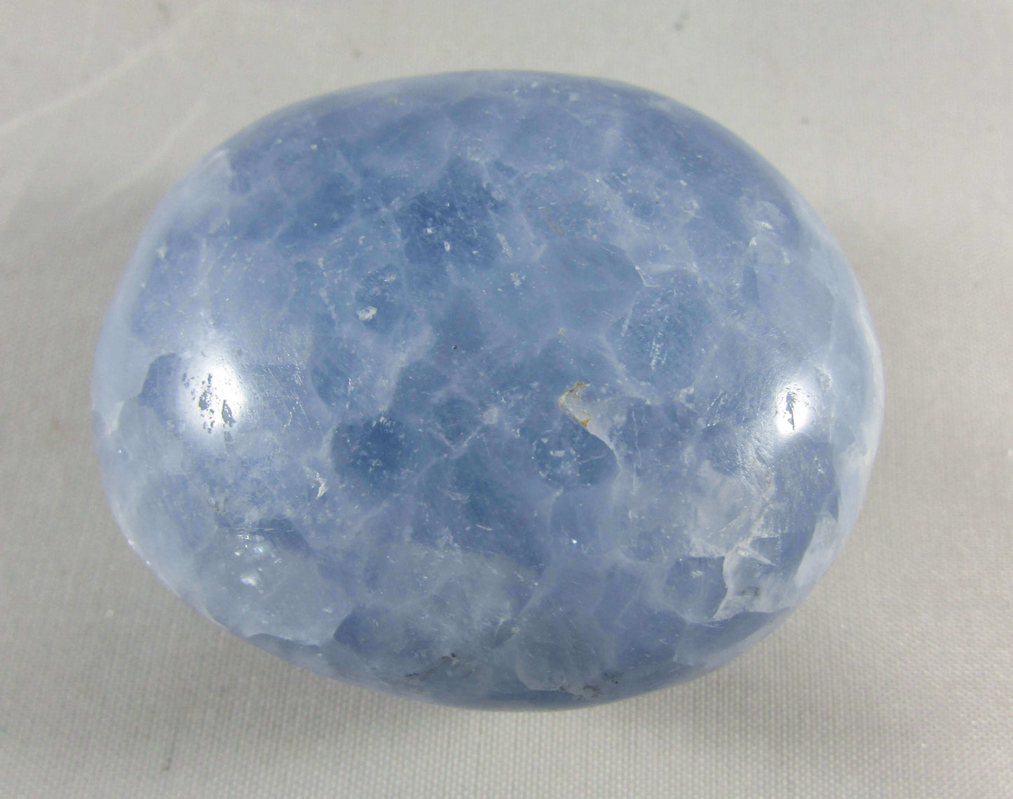 blue calcite crystal palmstone, polished worry stone