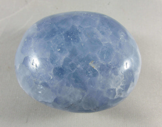 blue calcite crystal palmstone, polished worry stone