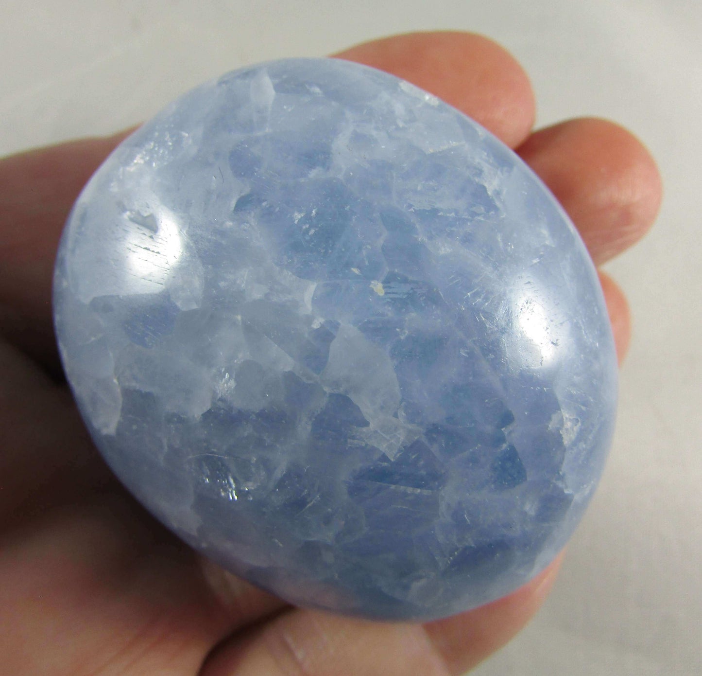 blue calcite crystal palmstone, polished worry stone