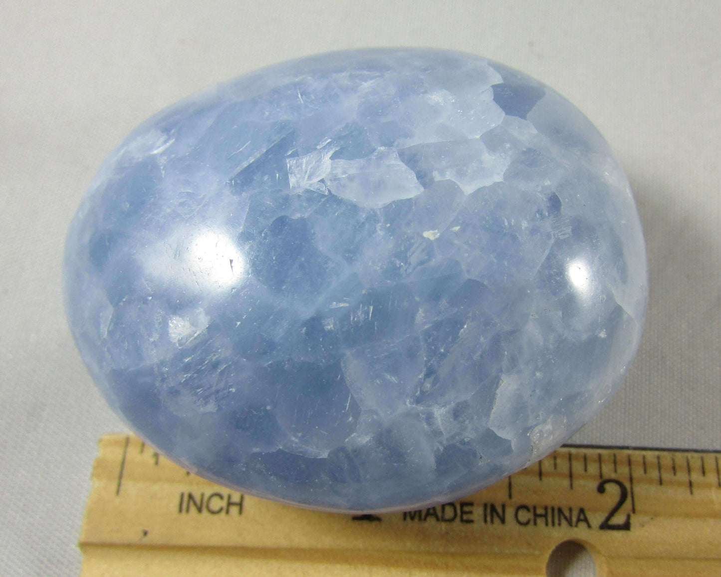 blue calcite crystal palmstone, polished worry stone