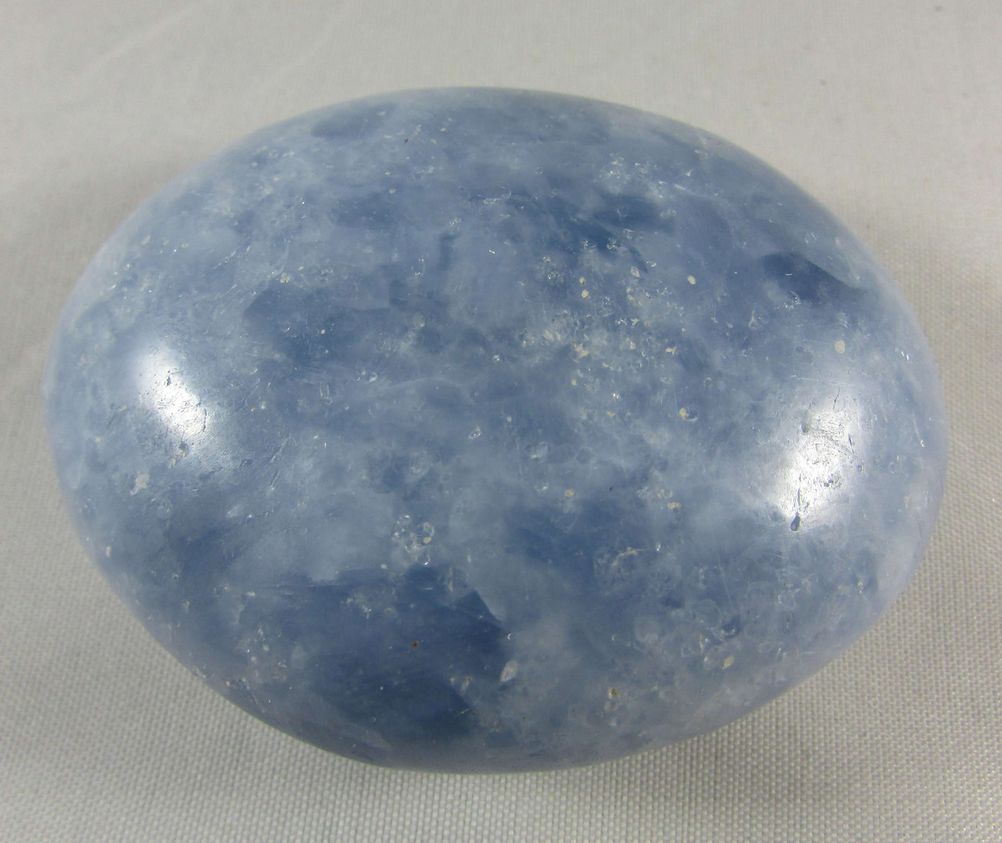 blue calcite crystal palmstone, polished worry stone