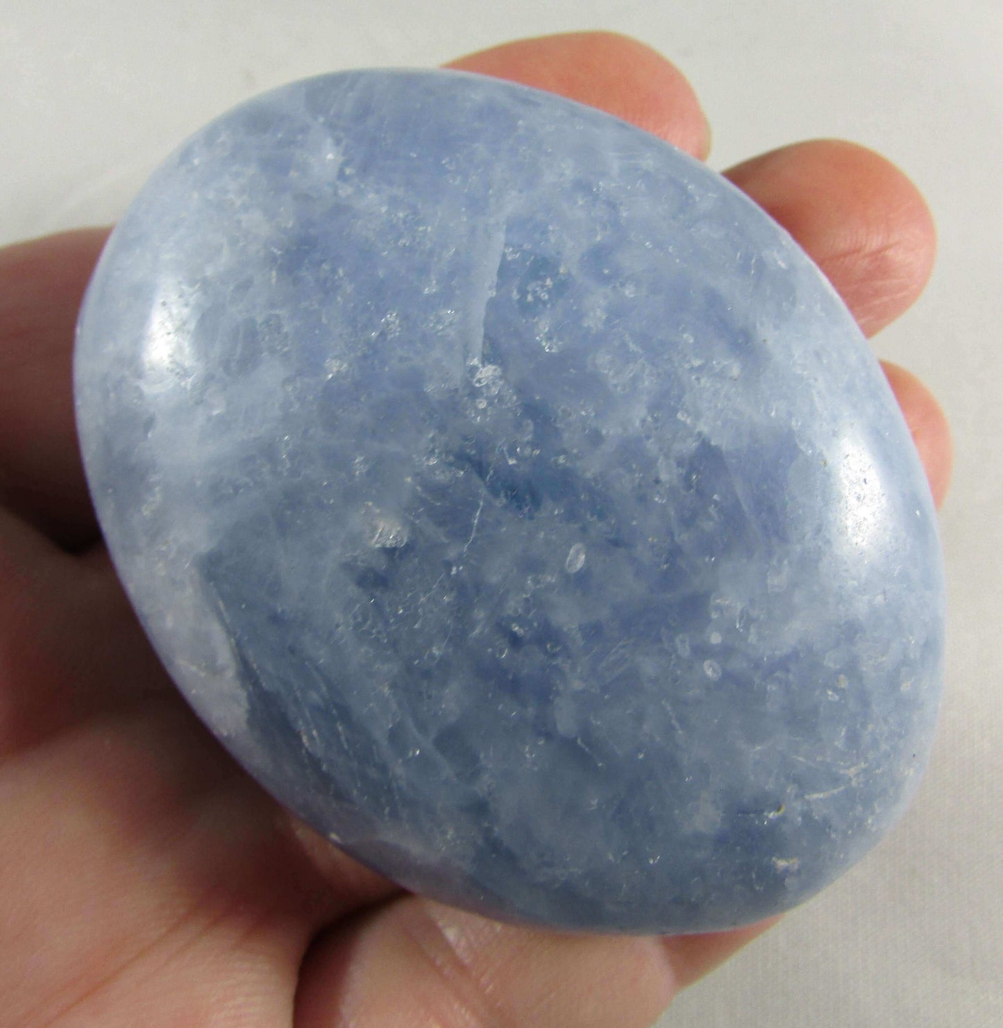 blue calcite crystal palmstone, polished worry stone