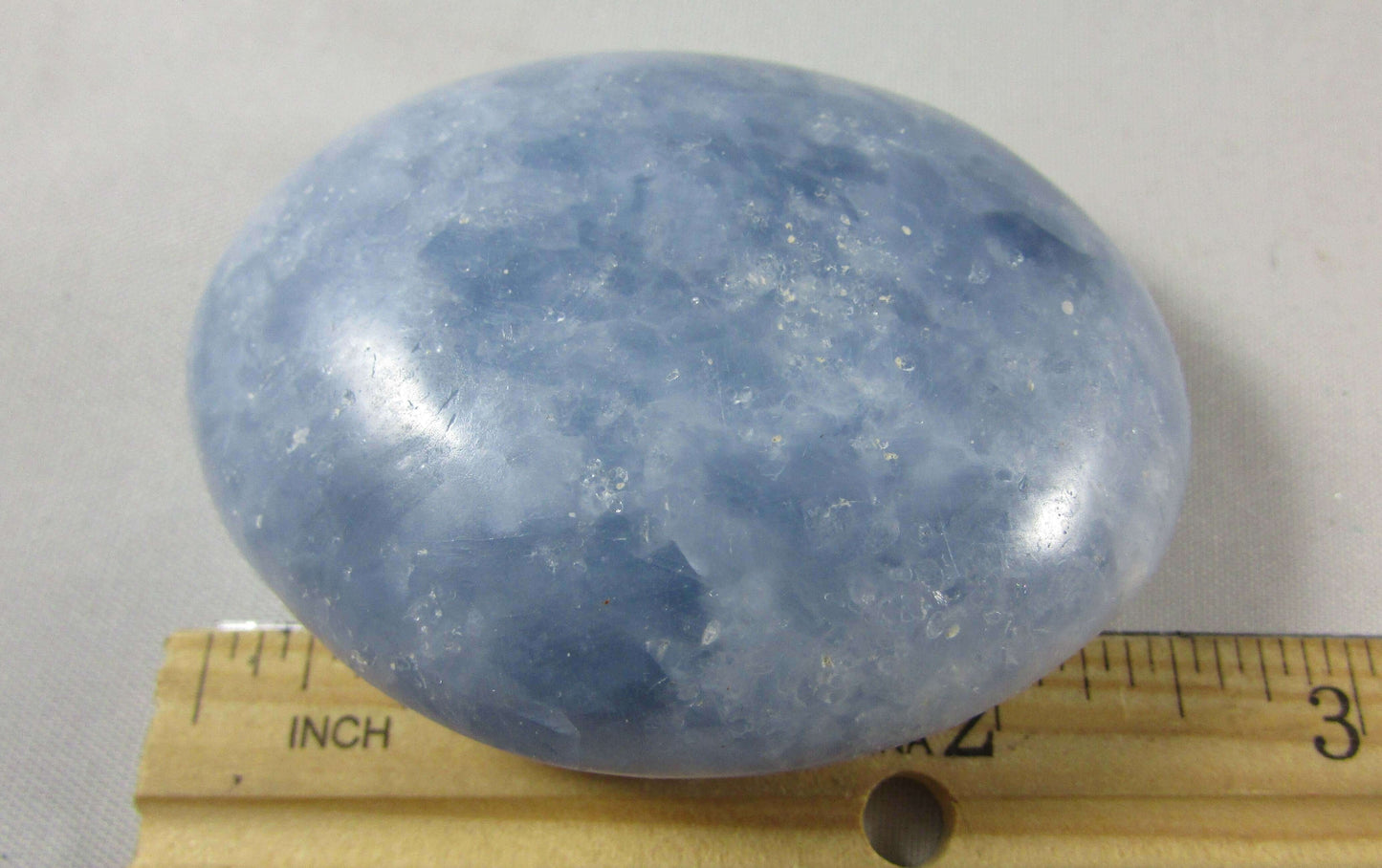 blue calcite crystal palmstone, polished worry stone