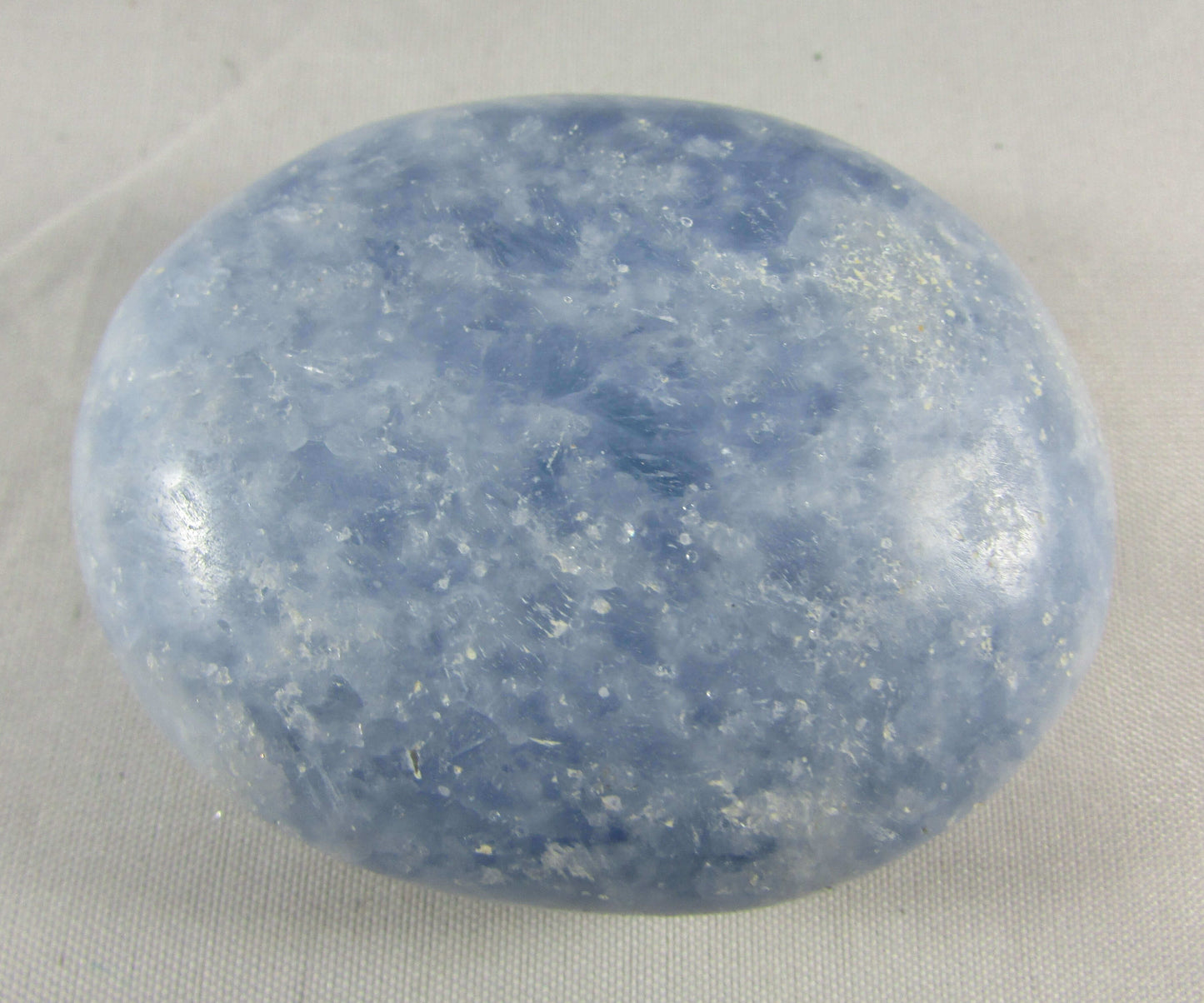 blue calcite crystal palmstone, polished worry stone
