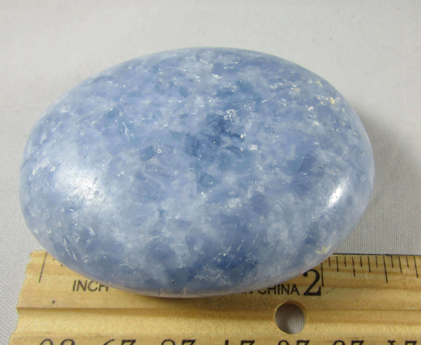 blue calcite crystal palmstone, polished worry stone