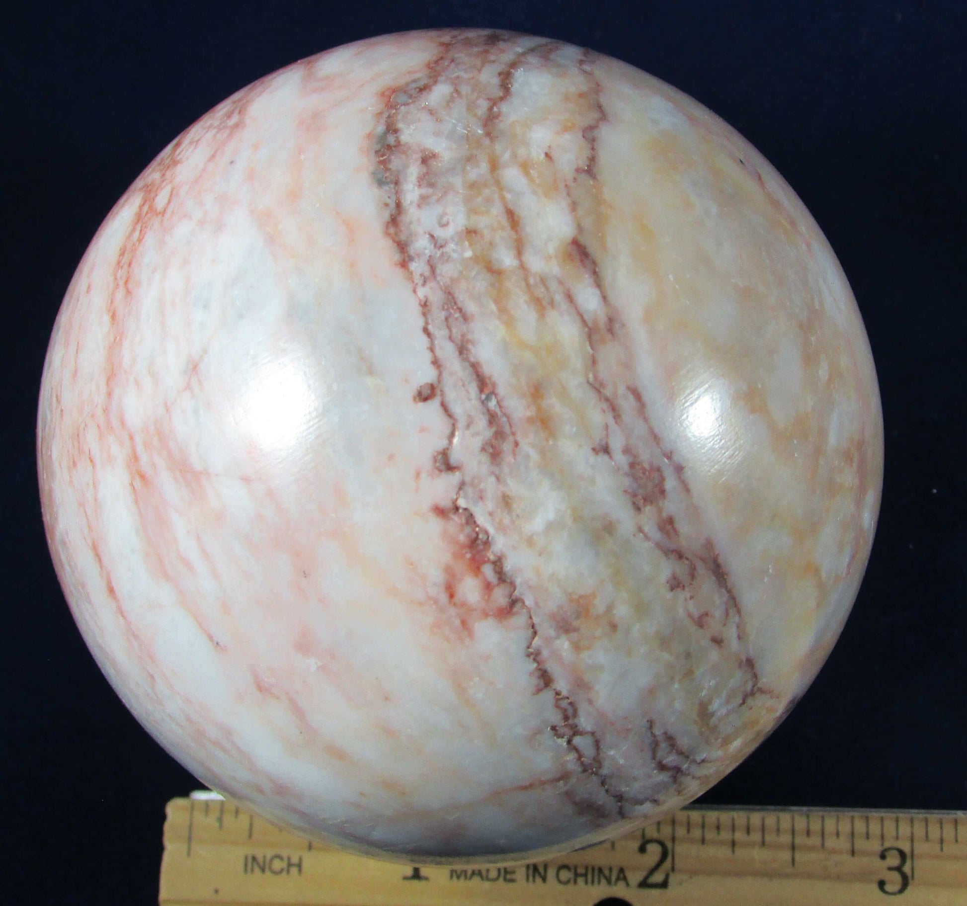 pink marble crystal sphere, polished crystal sphere