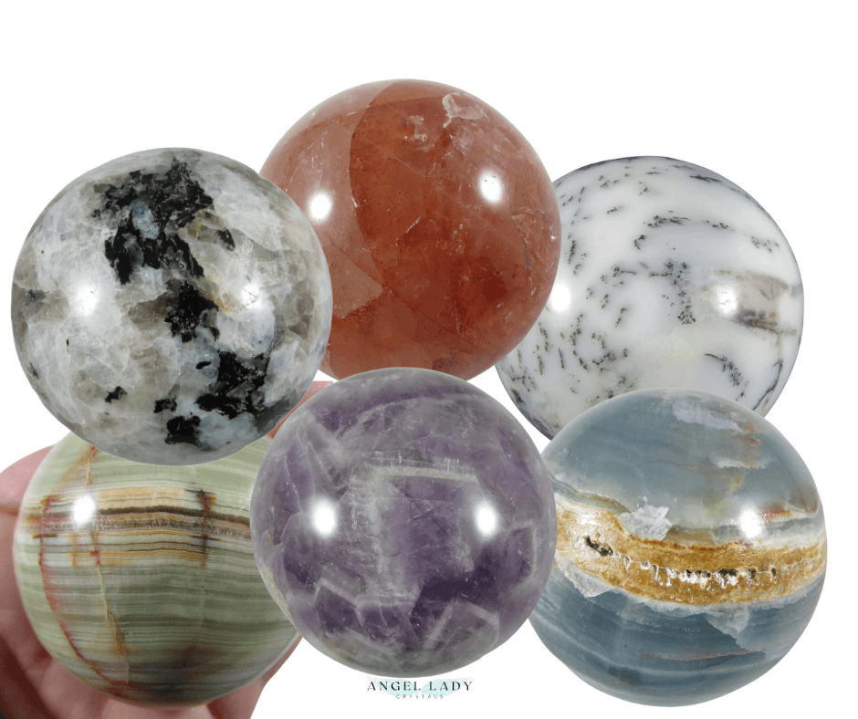crystal spheres - rainbow moonstone, red hematiod quartz, green banded onyx, chevron amethyst, white opal, lemurian aquataine calcite