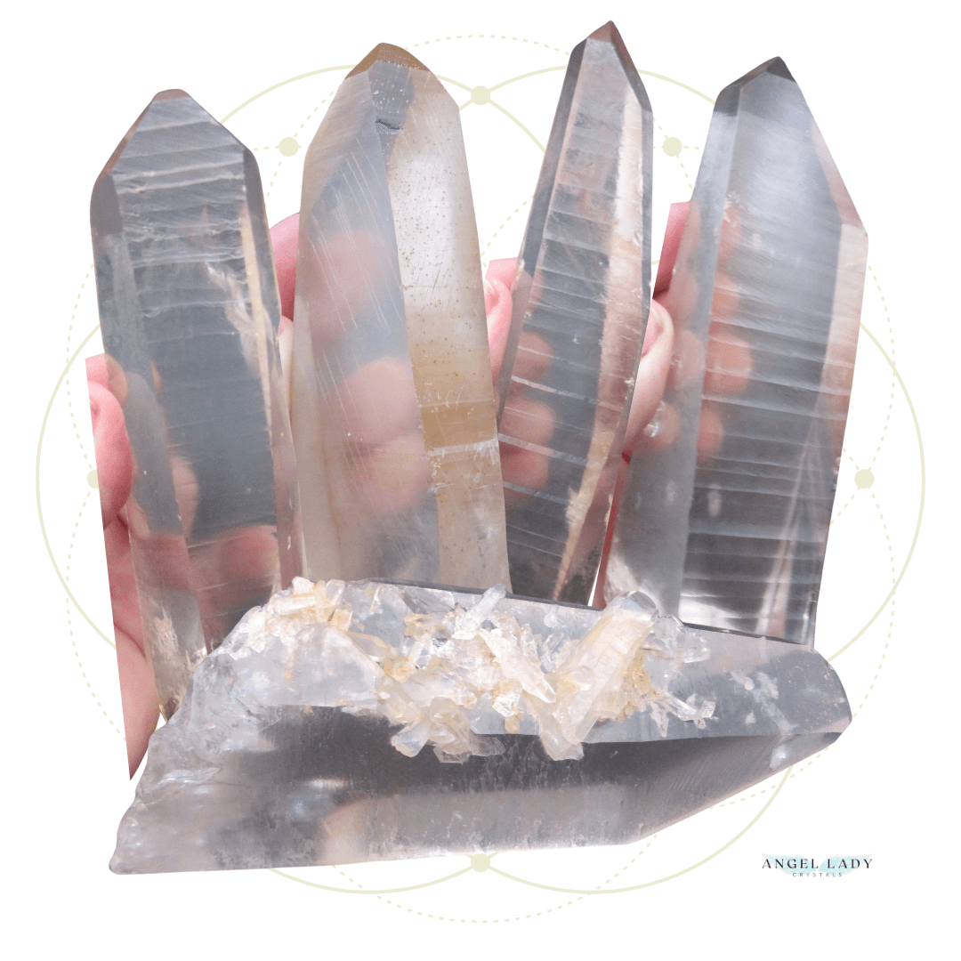 Lemurian Quartz Crystals, 4 vertical Lemurians and 1 horizontal Lemurian with barnacles