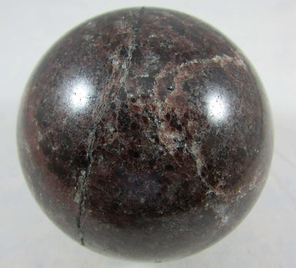 garnet crystal sphere, polished sphere, madagascar mineral