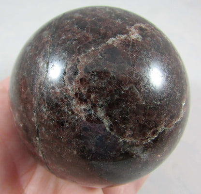 garnet crystal sphere, polished sphere, madagascar mineral