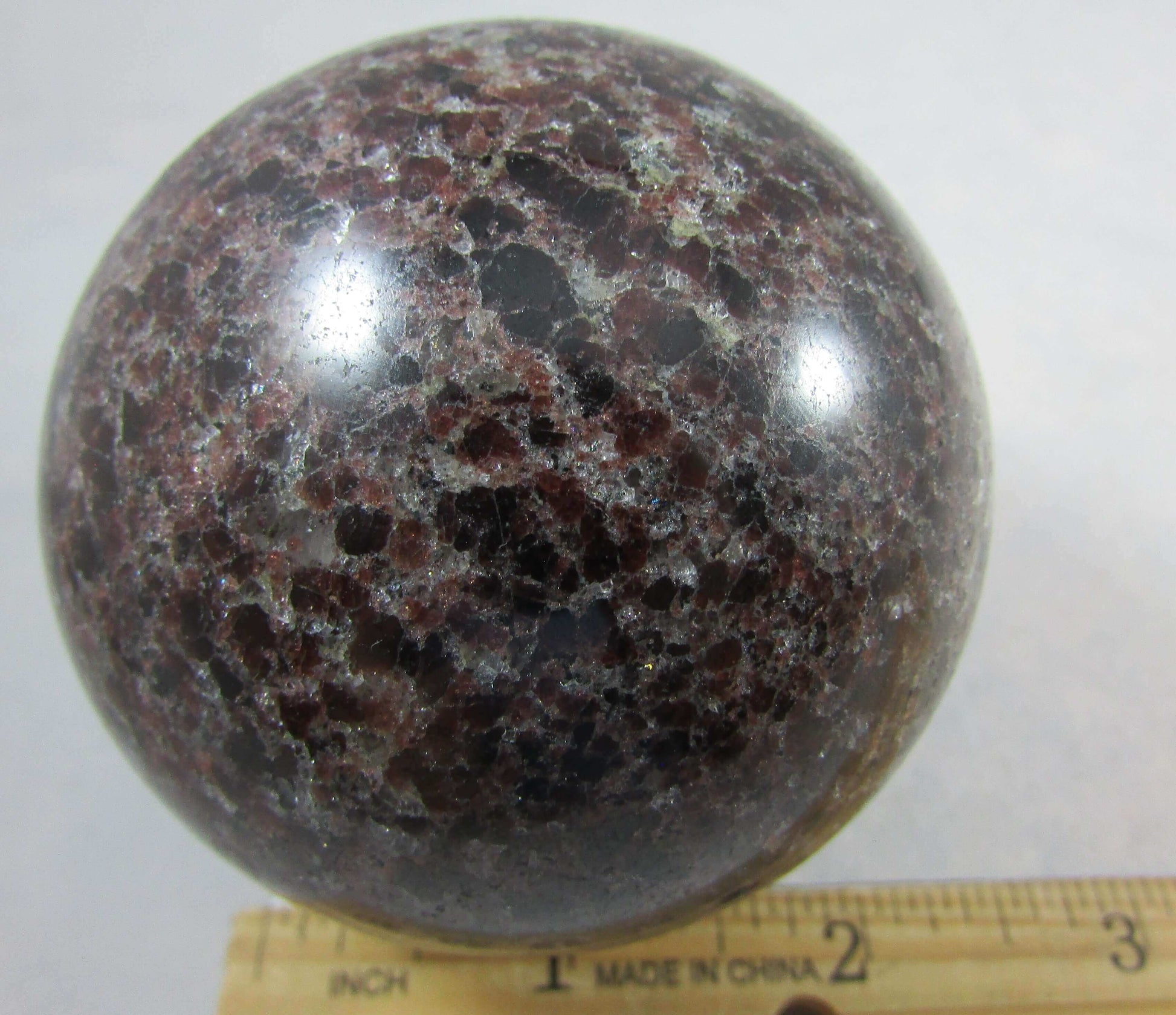 garnet crystal sphere, polished sphere, madagascar mineral