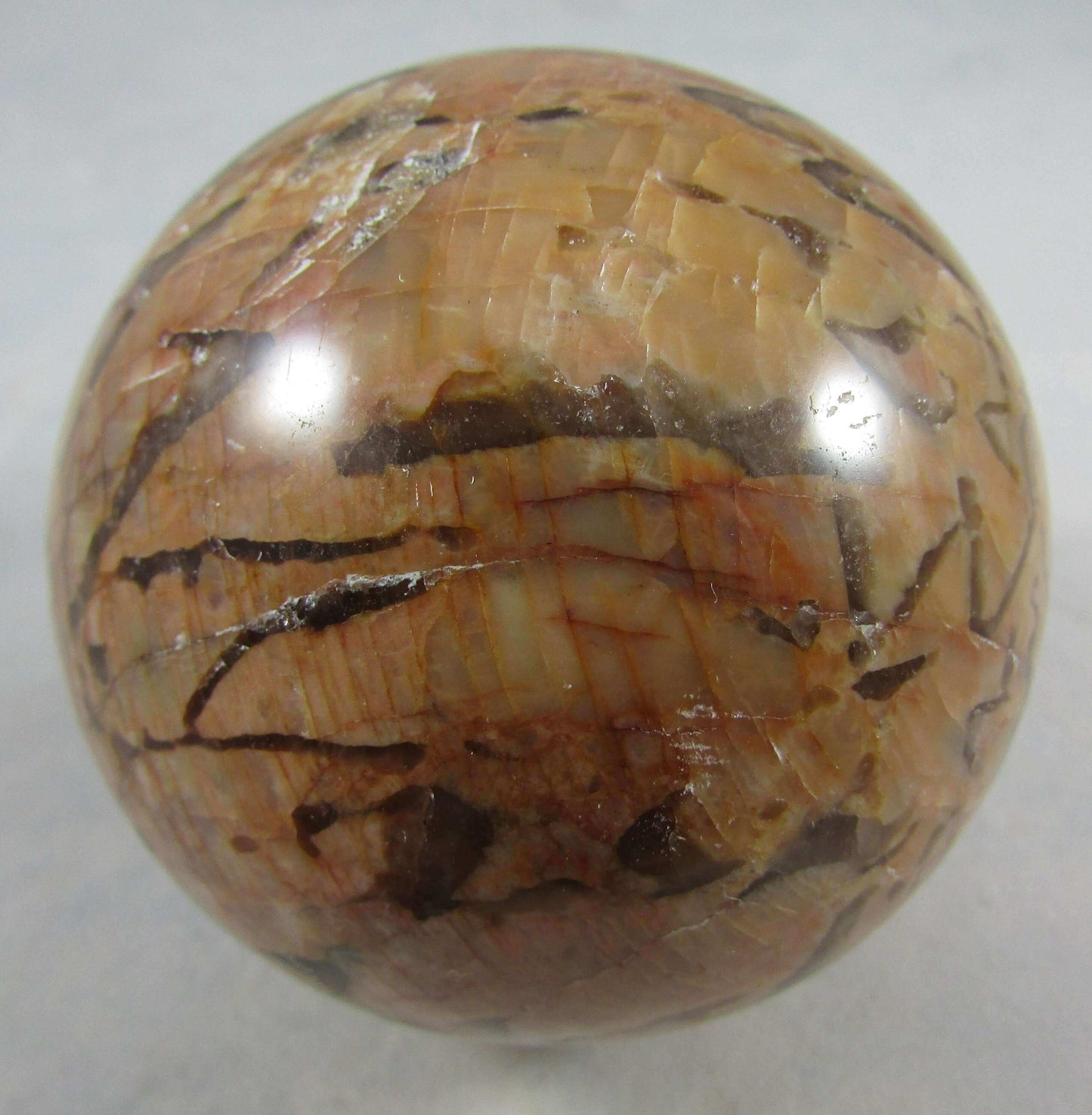 Red Zebra Moonstone Crystal Sphere (#ETE146)