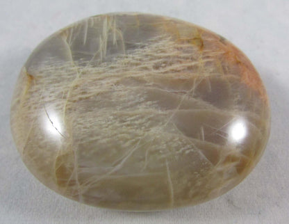 peach moonstone crystal palmstone, worry stone, madagascar