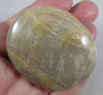 peach moonstone crystal palmstone, worry stone, madagascar