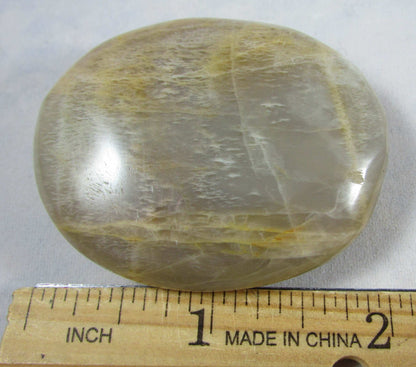 peach moonstone crystal palmstone, worry stone, madagascar