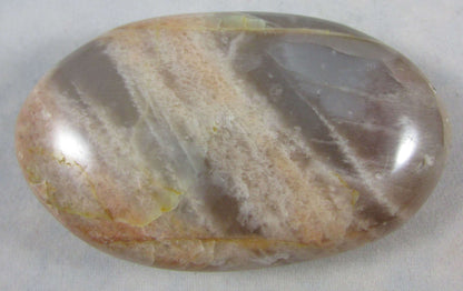 peach moonstone crystal palmstone, worry stone, madagascar