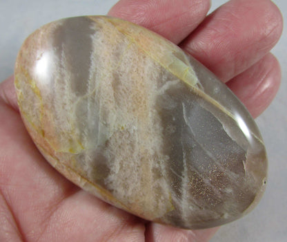 peach moonstone crystal palmstone, worry stone, madagascar