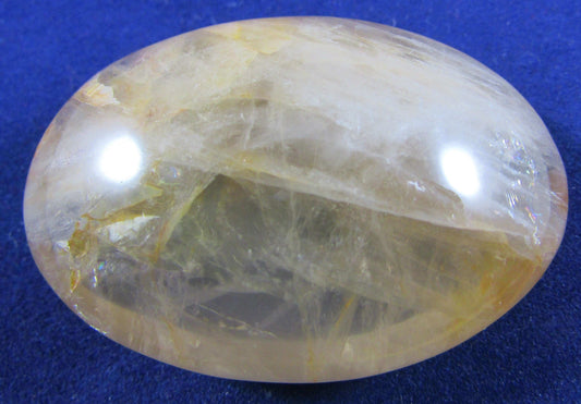 Golden Healer Crystal palmstone polished madagascar crystal