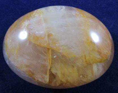 Golden Healer Crystal palmstone polished madagascar crystal