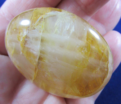 Golden Healer Crystal palmstone polished madagascar crystal