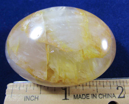 Golden Healer Crystal palmstone polished madagascar crystal