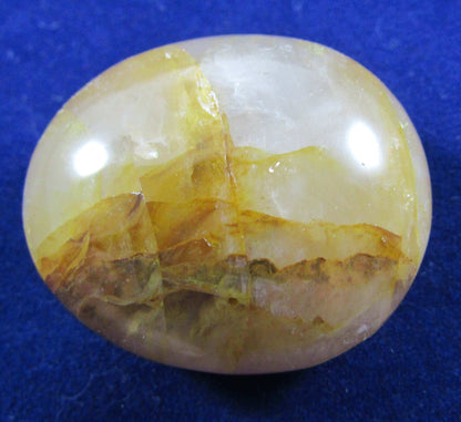 Golden Healer Crystal palmstone polished madagascar crystal