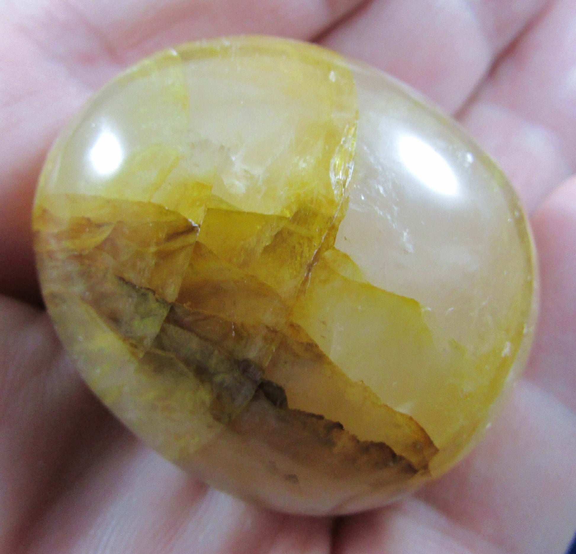 Golden Healer Crystal palmstone polished madagascar crystal