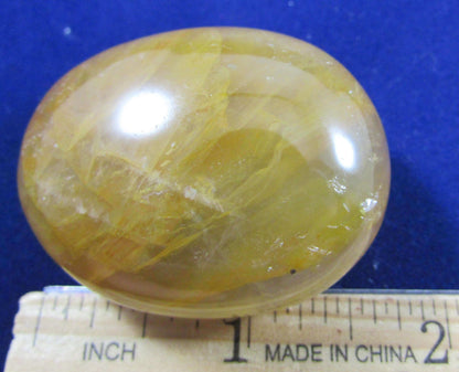 Golden Healer Crystal palmstone polished madagascar crystal