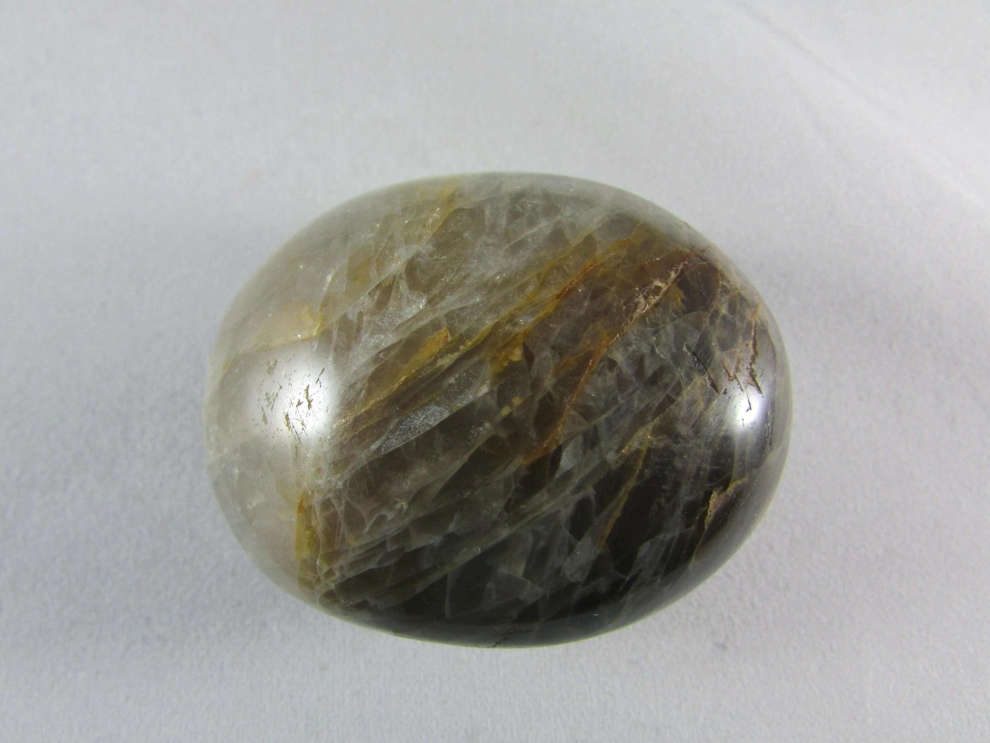 black moonstone crystal palmstone, worry stone, madagascar