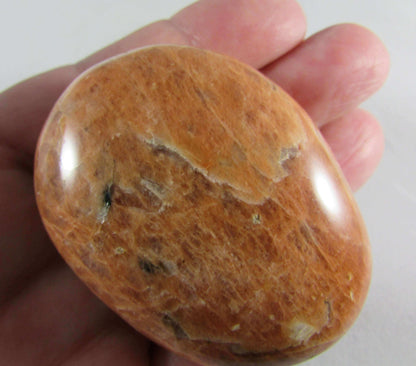 peach moonstone crystal palmstone, worry stone, madagascar