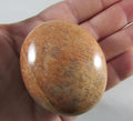 peach moonstone crystal palmstone, worry stone, madagascar