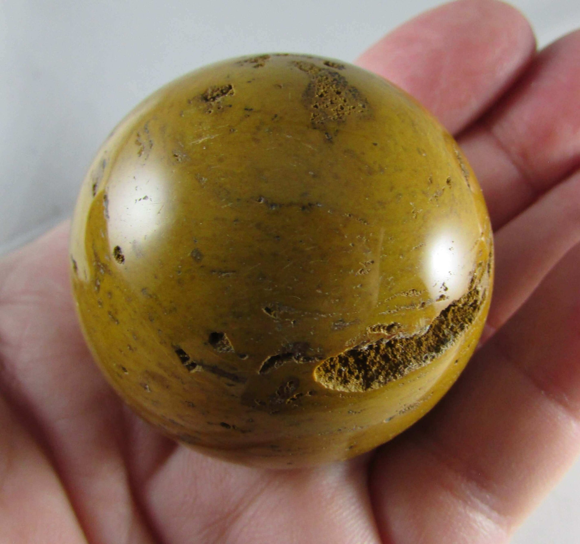 yellow jasper crystal sphere, madagascar mineral