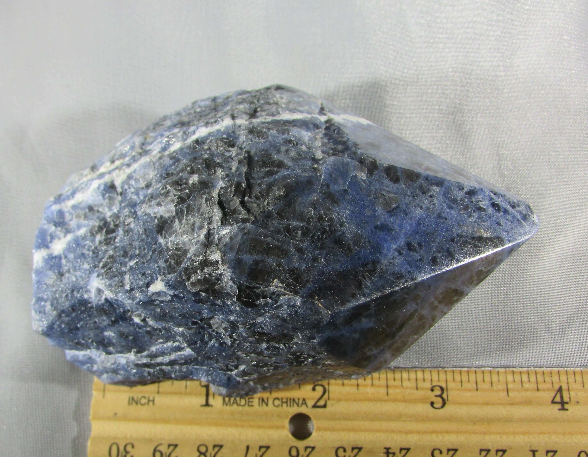 sodalite rough point, top polished point, brazil crystal