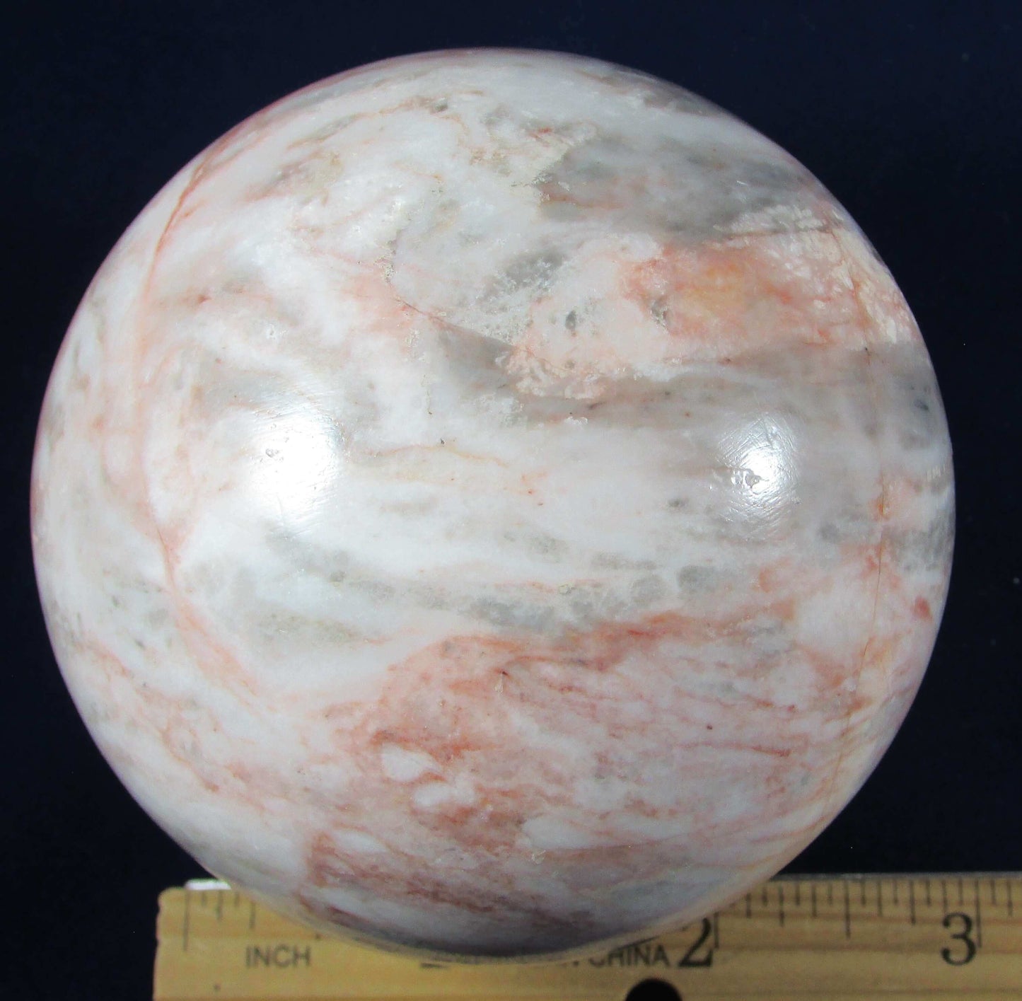 pink marble crystal sphere, polished crystal sphere