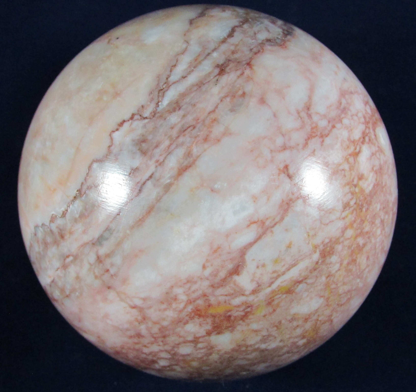 pink marble crystal sphere, polished crystal sphere