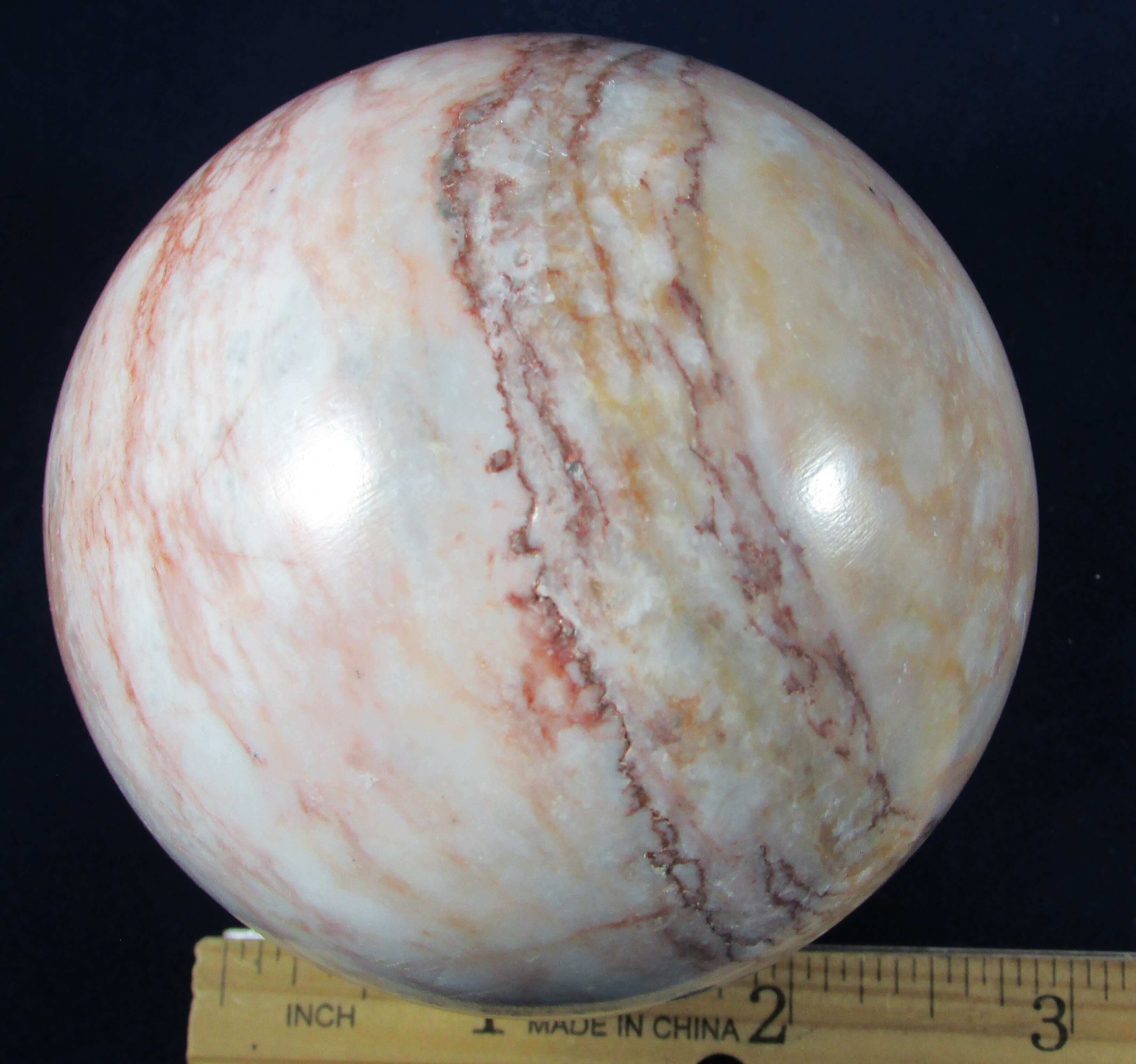 pink marble crystal sphere, polished crystal sphere