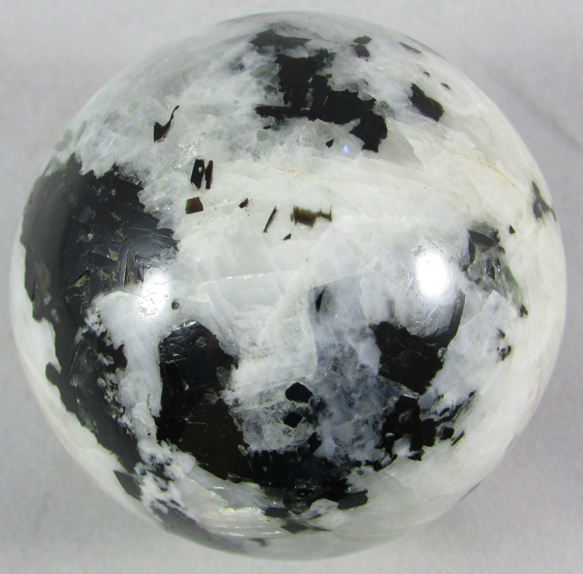 rainbow moonstone crystal sphere, polished crystal ball