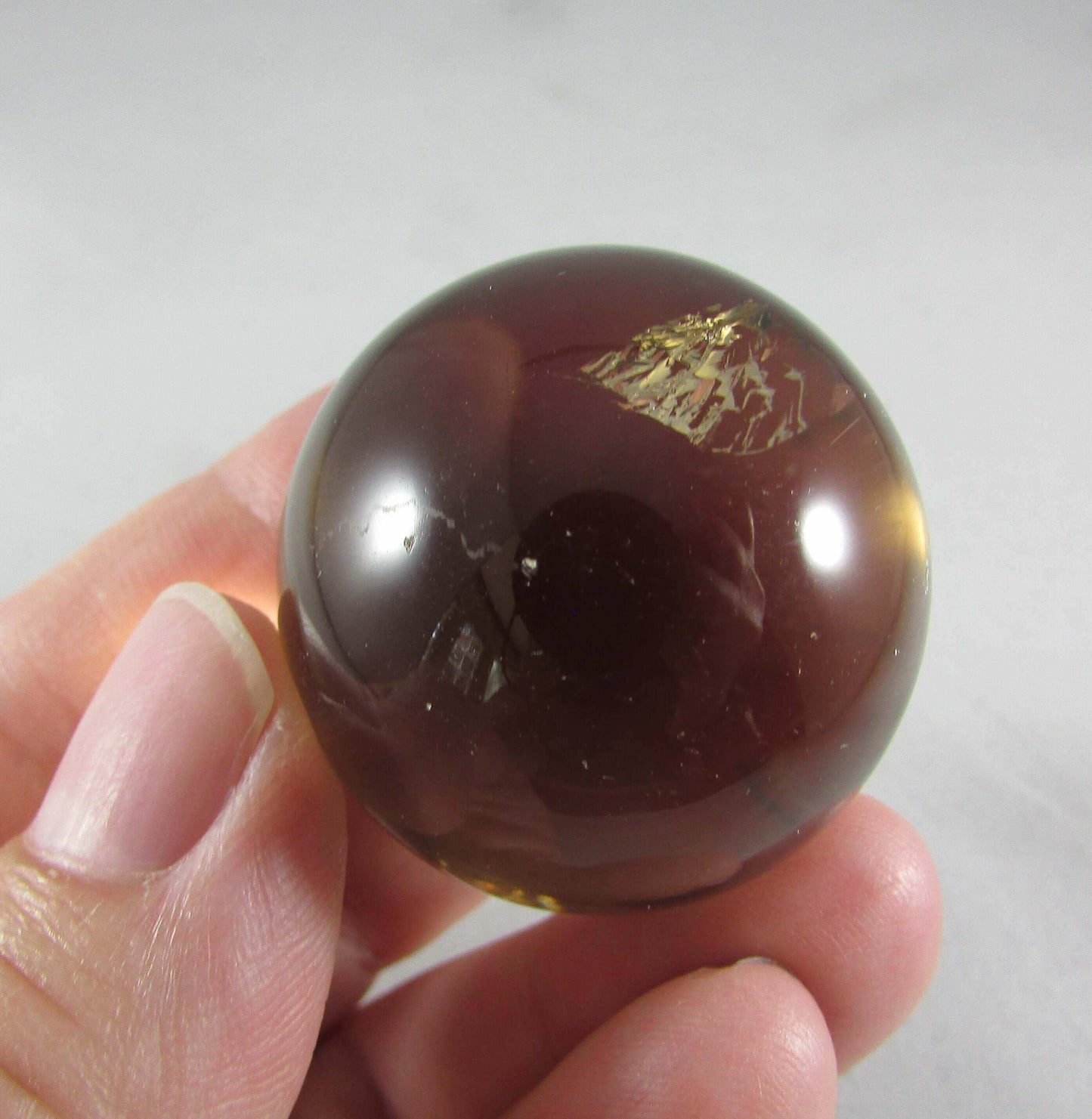Natural polished Smoky Quartz crystal sphere brazil