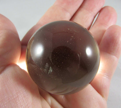 Natural polished Smoky Quartz crystal sphere brazil