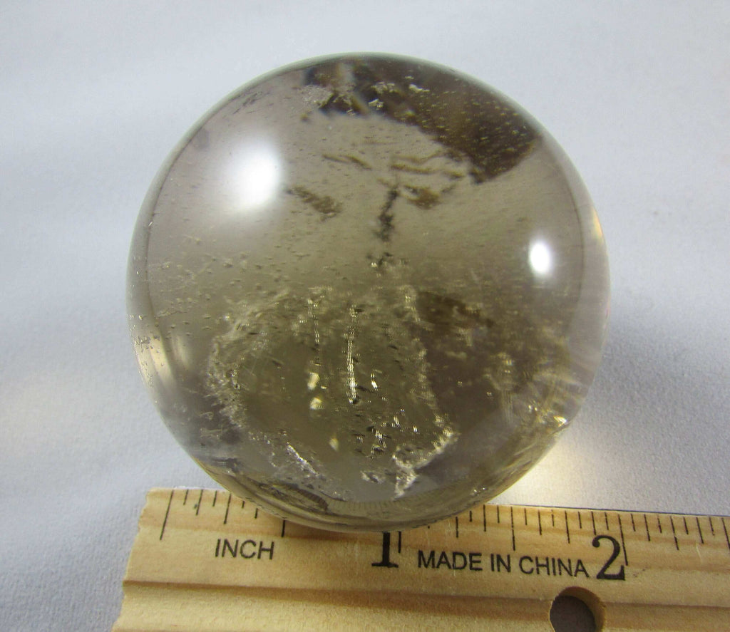 Natural polished Smoky Quartz crystal sphere brazil