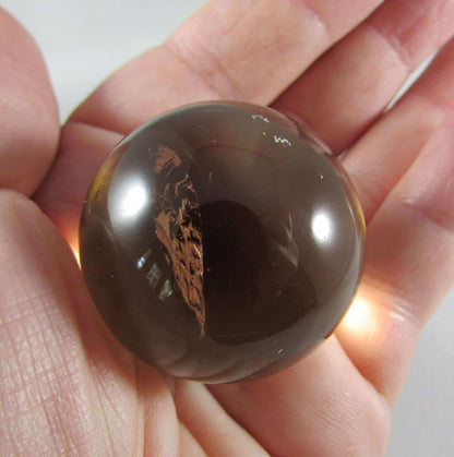 Natural polished Smoky Quartz crystal sphere brazil