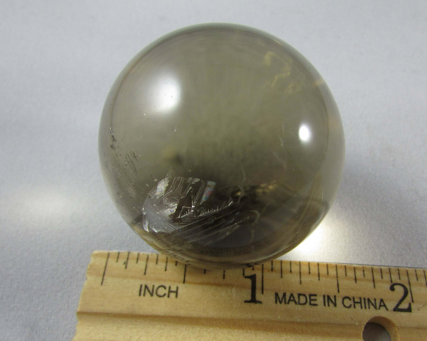 Natural polished Smoky Quartz crystal sphere brazil